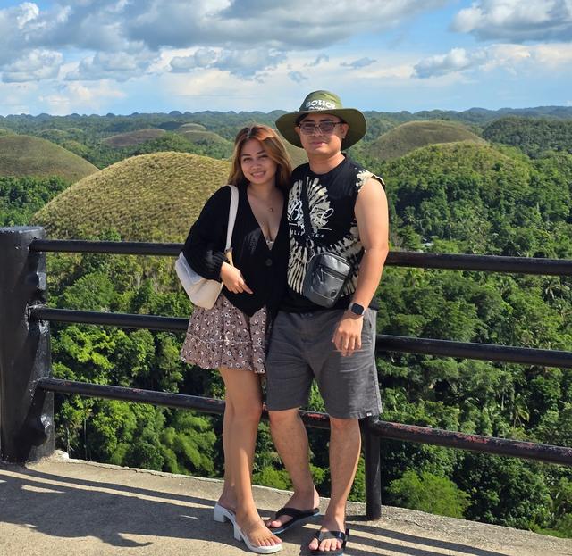 Rica Mae and Mark Lino standing together at the Chocolate Hills
