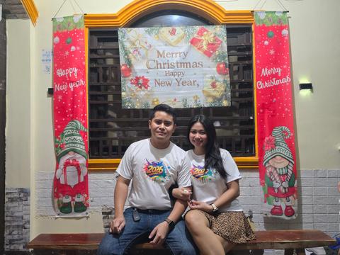 Rica Mae and Mark Lino sitting together in matching white shirts